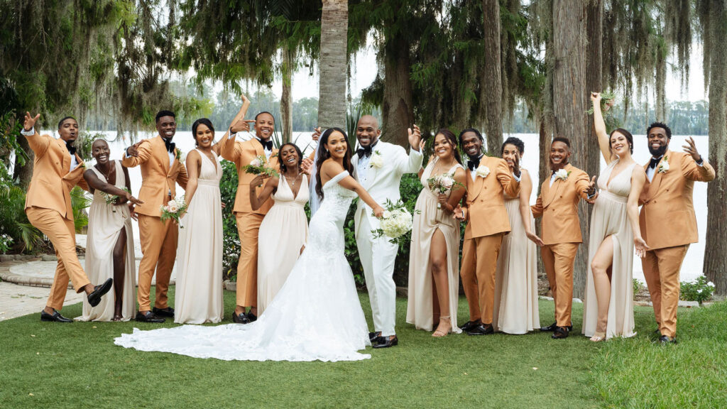 a group of people celebrate the newlyweds